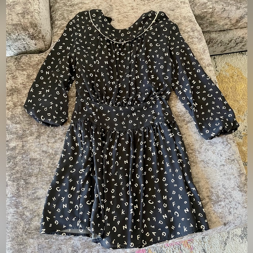 Woman’s Black Dress with letter pattern